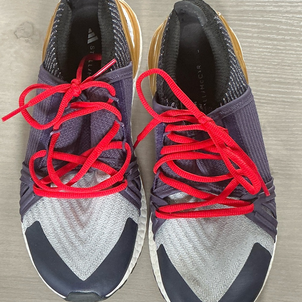 Adidas Sneakers with Red and Silver Accents